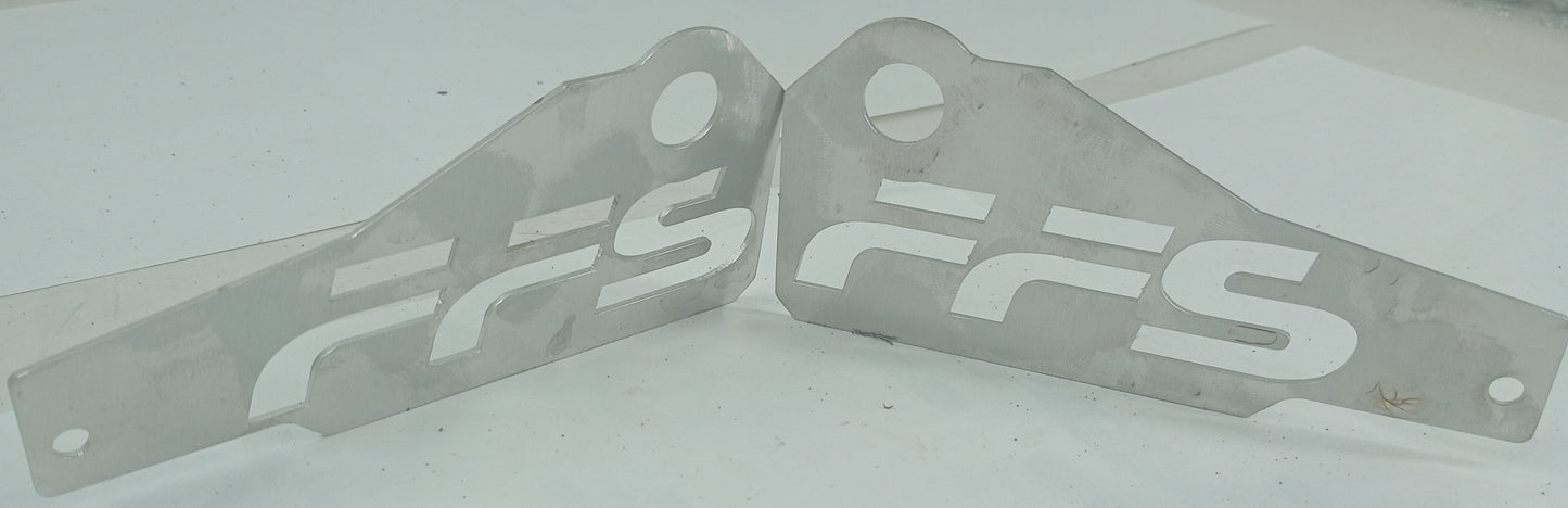Two metal brackets with 'FFS' branding on a white surface