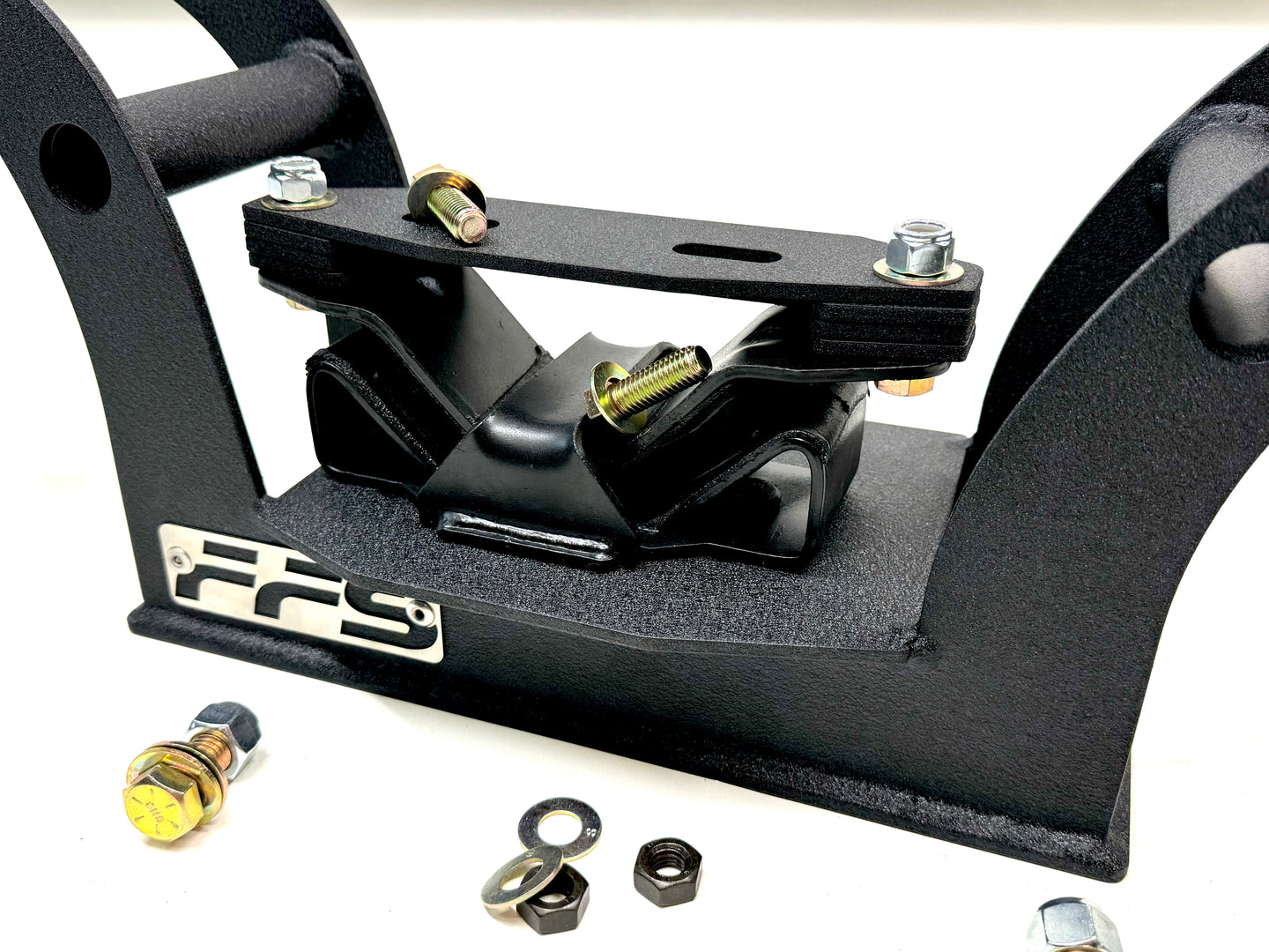 Custom Far From Stock Crossmember's top section. Close up image, wrinkle black powder coating. 