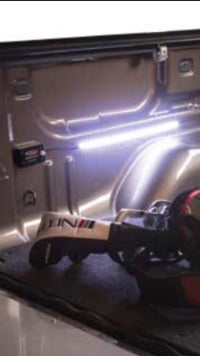 Access bed cover lighting